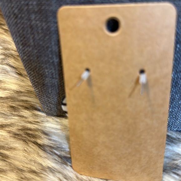 Very pretty pair of black and white earrings. They are pierced.​​ - Picture 2 of 2